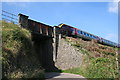 SX8465 : Railway Bridge north of Combe Fishacre by Tony Atkin