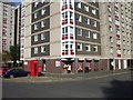 Shop at the base of a tower block, Callendar Park