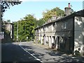 Houses and a bend in the road, Rochdale Road A58, Kebroyd, Sowerby