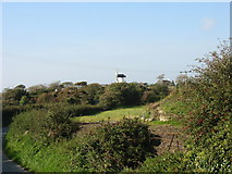 SH3485 : View across farmland to Melin Llynnon and Ty'n Felin by Eric Jones
