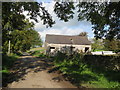 SK1855 : Lane view of farm building beyond Foufinside Farm by Alan Heardman