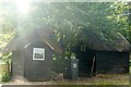 Two thatched sheds