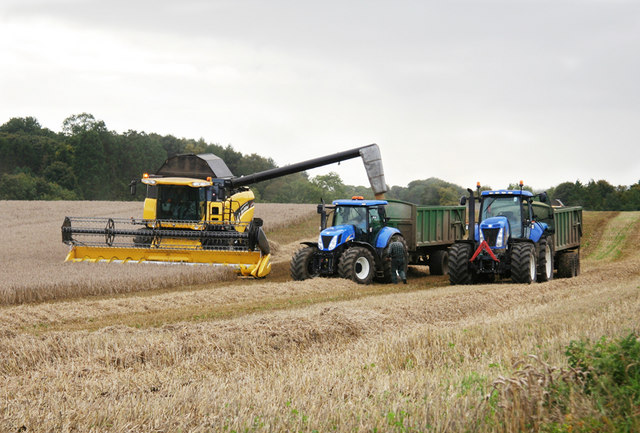 Combine and tractors next to the A695 © Helen Wilkinson :: Geograph ...